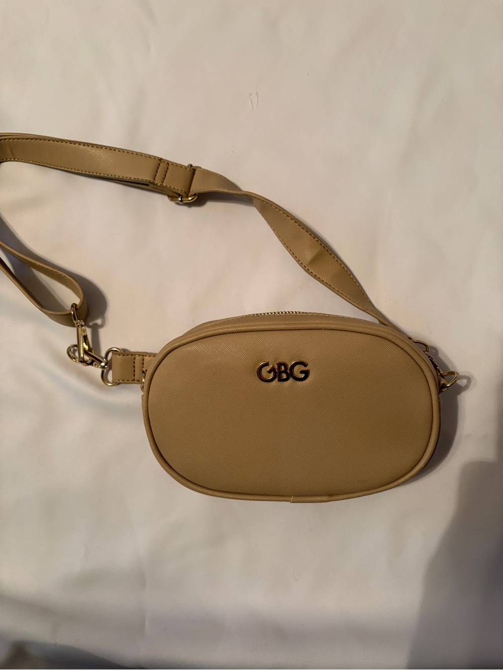 GBG Los Angeles Beige Oval Crossbody Bag